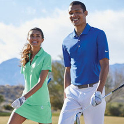 Man and woman golfing